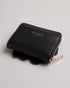 <P>Flower Laser Cut Zip Purse</P>